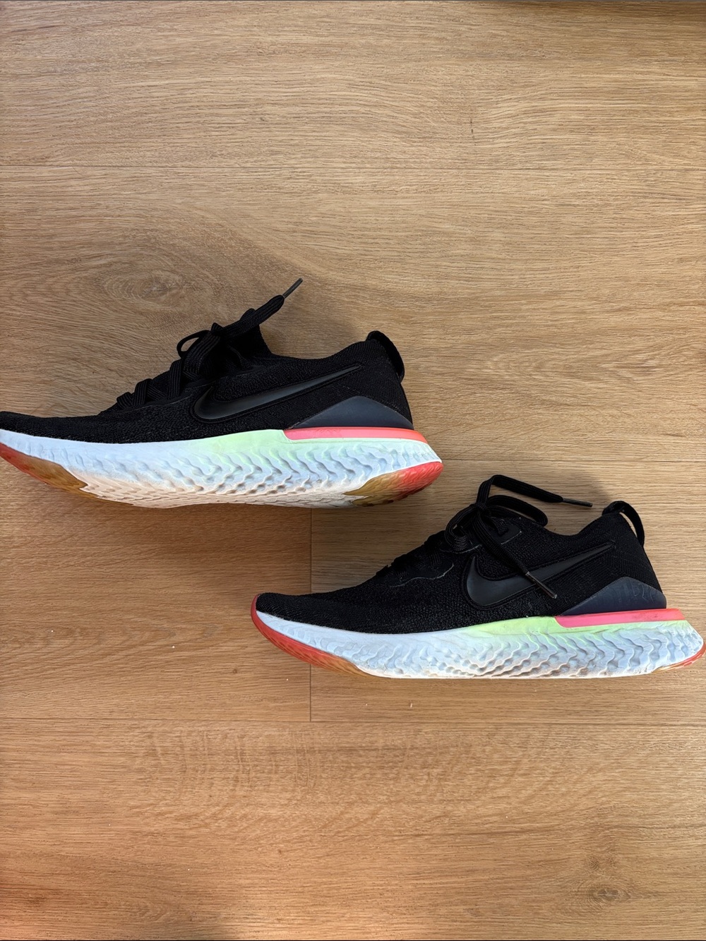 Nike Black Running Shoes with Neon Green and Coral Details